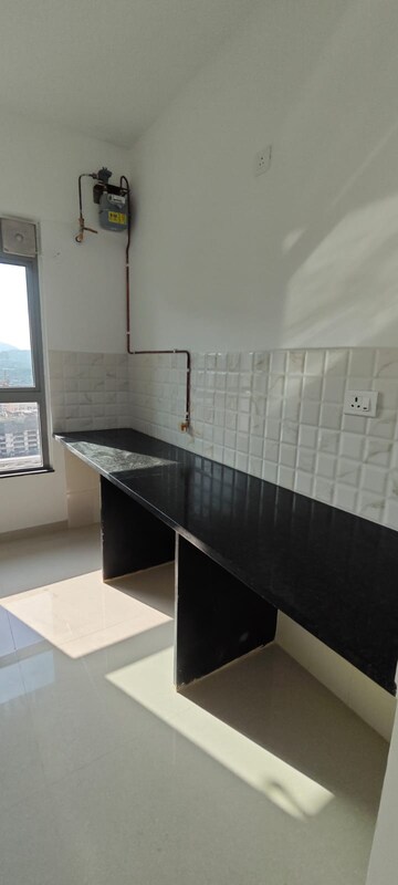 Kitchen in 1 BHK Apartment at Kalpataru Immensa, Kolshet Road – for Sale
