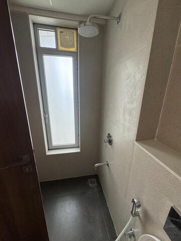 Bathroom in 2 BHK Apartment at Piramal Vaikunth Vijit, Balkum Pada – for Rent