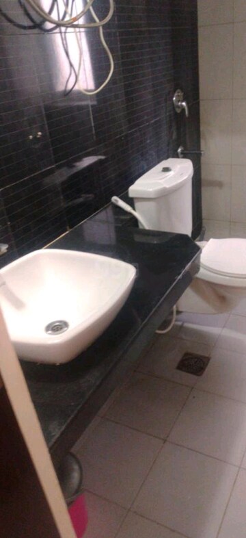 Bathroom in 2 BHK Apartment at Godrej Woods, Sector 43 – for Sale