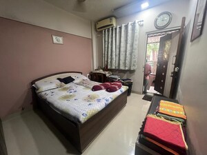 Bedroom in 2.5 BHK Apartment at Kopar Khairane – for Sale
