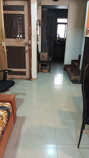 Living Room in 2.5 BHK Apartment at Kopar Khairane – for Sale