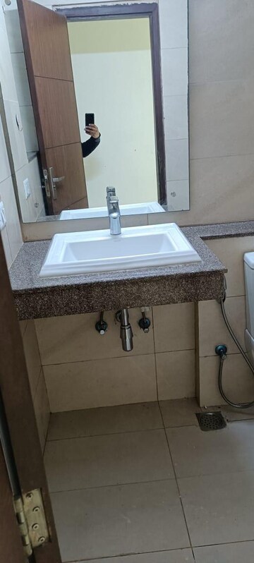Bathroom in 3 BHK Apartment at Puri Aanandvilas, Sector 81 – for Sale