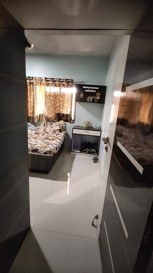 Master Bedroom in 3 BHK Apartment at Globe Heights, Goregaon East – for Sale