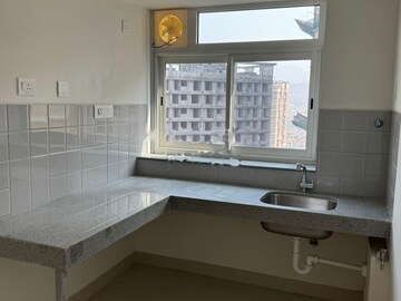 Kitchen in 2 BHK Apartment at Shapoorji Pallonji Sarova, Kandivali East – for Rent
