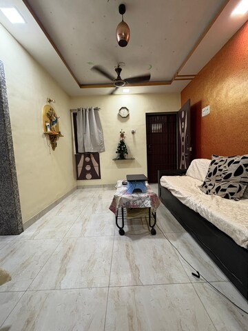 Living Room in 1 BHK Apartment at Lokpuram CHS, Vasant Vihar – for Sale