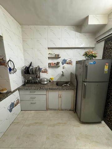 Kitchen in 1 BHK Apartment at Lokpuram CHS, Vasant Vihar – for Sale