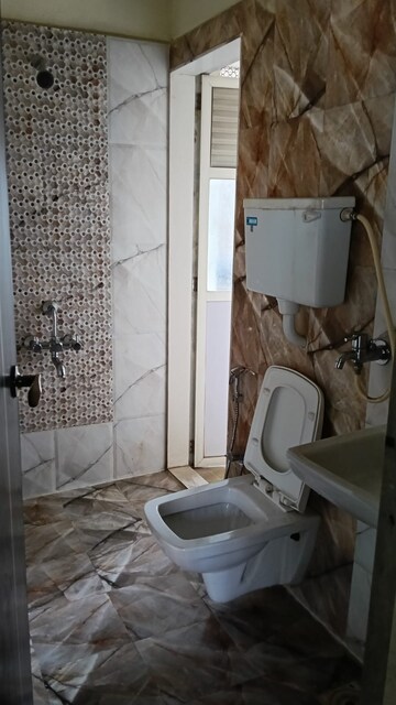 Bathroom in 2 BHK Apartment at Rosa Gardenia, Ghodbunder Road – for Rent