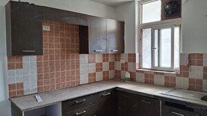 Kitchen in 2 BHK Apartment at Ansal Housing Woodbury, Patiala Road – for Sale