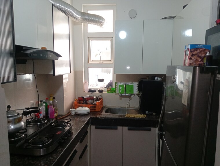 Kitchen, divine-meadows 2.5 Bedroom 1227 Sq.Ft. Apartment In Sector 108 Noida 8792478