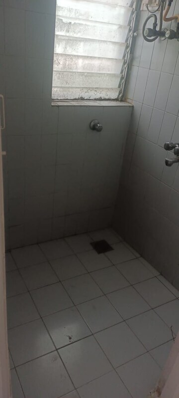 Bathroom in 2 BHK Apartment at Nebula Empress, Khar West – for Rent