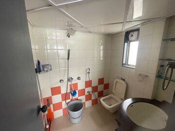 Bathroom in 2 BHK Apartment at Tarangini CHS, Andheri West – for Rent