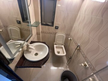 Bathroom in 2 BHK Apartment at Tarangini CHS, Andheri West – for Rent
