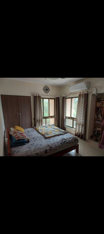 Bedroom in 2 BHK Apartment at NRI Complex Phase 2, Seawoods – for Rent