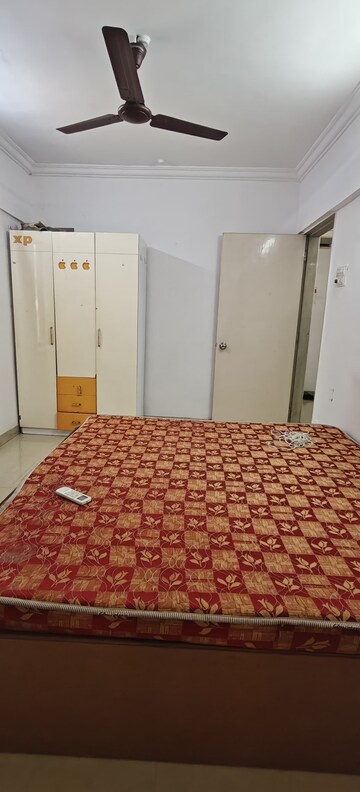 Bedroom in 2 BHK Apartment at Surya Kiran CHS Andheri, Andheri West – for Rent