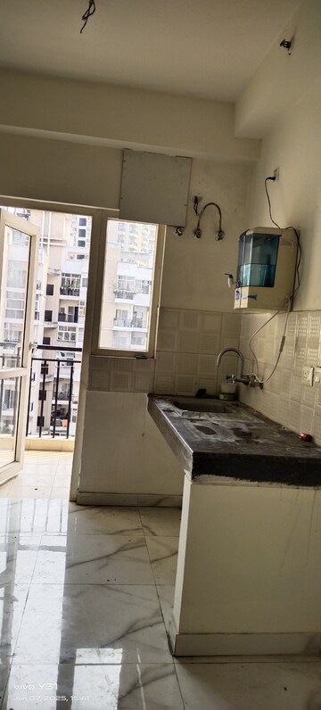 Kitchen in 2.5 BHK Apartment at Geotech Pristine Avenue, Sector 16c Greater Noida – for Rent