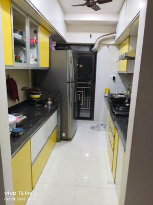 Kitchen in 3 BHK Apartment at Raunak Park View, Ghodbunder Road – for Sale