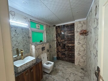 Bathroom in 3 BHK Builder Floor at Ansal Sushant Lok I, Sector 43 – for Rent