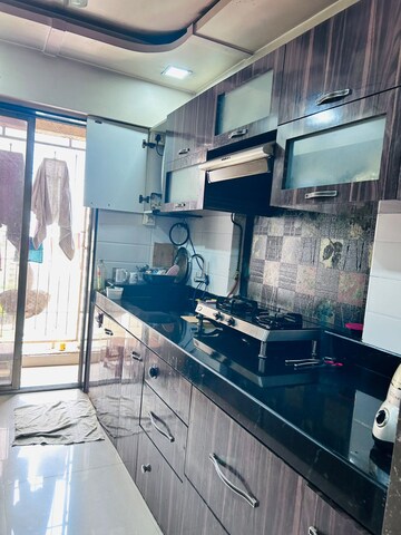 Kitchen in 1 BHK Apartment at Madhav Palacia, Ghodbunder Road – for Rent
