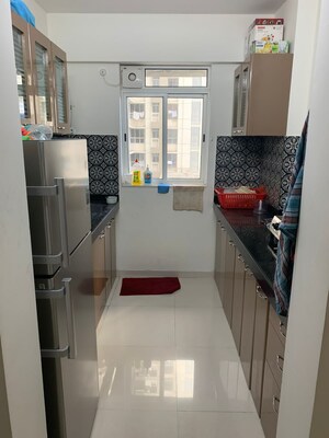 Kitchen in 1 BHK Apartment at Lodha Amara, Kolshet Road – for Sale