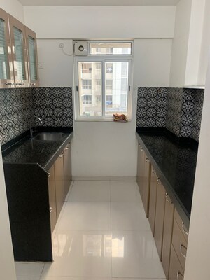 Kitchen in 1 BHK Apartment at Lodha Amara, Kolshet Road – for Sale