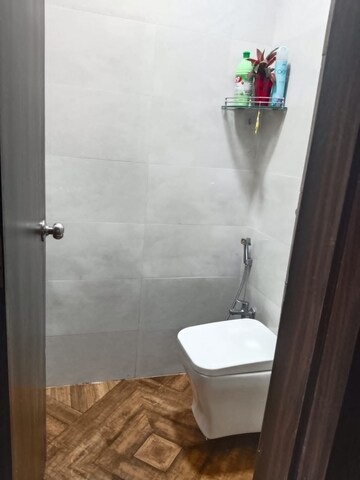 Bathroom in 1 BHK Apartment at Shree Tirupati STG Signature Residency, Patlipada – for Rent