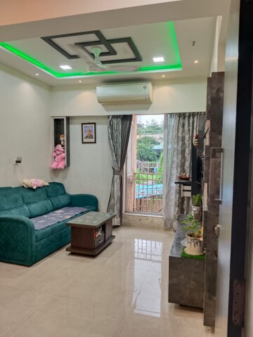 Living Room in 1 BHK Apartment at Shree Tirupati STG Signature Residency, Patlipada – for Rent