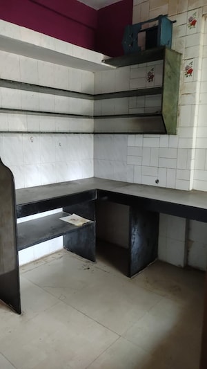 Kitchen in 2 BHK Apartment at Nirvana Gardens, Khadakpada – for Sale