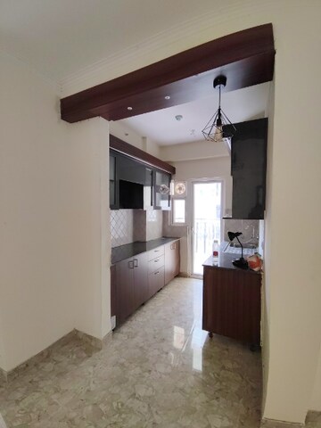 Kitchen in 3 BHK Apartment at Amrapali Centurian Park Phase II, Tech Zone 4 Greater Noida – for Rent