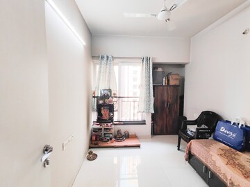 Living Room in 2 BHK Apartment at Rustomjee Urbania Azziano, Thane West – for Sale