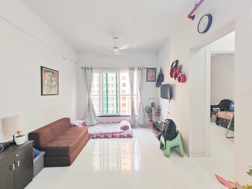 Living Room in 2 BHK Apartment at Rustomjee Urbania Azziano, Thane West – for Sale