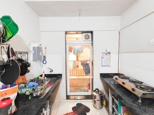 Kitchen in 2 BHK Apartment at Rustomjee Urbania Azziano, Thane West – for Sale