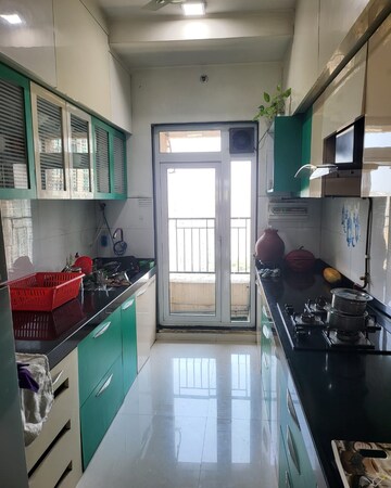 Kitchen in 1 BHK Apartment at Hiranandani Estate Flora, Ghodbunder Road – for Rent