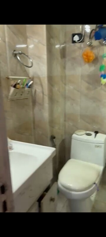 Bathroom in 2.5 BHK Apartment at Rishabh Paradise, Abhay Khand – for Sale