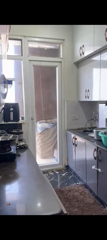 Kitchen in 2.5 BHK Apartment at Rishabh Paradise, Abhay Khand – for Sale