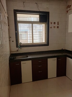 Kitchen in 1 BHK Apartment at Jai Mata Di Complex, Kalher – for Sale