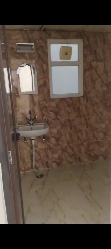 Bathroom in 2 BHK Apartment at Rishabh Paradise, Abhay Khand – for Sale
