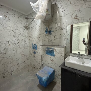 Bathroom in 3 BHK Builder Floor at Freedom Fighters Enclave – for Sale