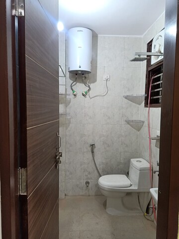 Bathroom in 2 BHK Builder Floor at Chattarpur – for Sale