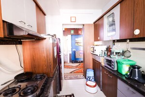 Kitchen in 2.5 BHK Apartment at Pride Presidency Luxuria, Ghodbunder Road – for Sale