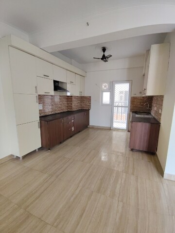 Kitchen in 4 BHK Apartment at Amrapali Centurian Park Phase II, Tech Zone 4 Greater Noida – for Rent
