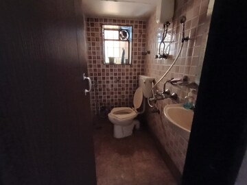 Bathroom in 2 BHK Apartment at Vashi Sector 12 – for Sale
