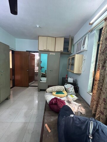 Bedroom in 2 BHK Apartment at Ekta Meadows, Borivali East – for Sale