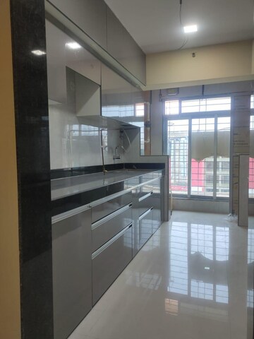 Kitchen in 2 BHK Apartment at Cosmos Habitat, Majiwada – for Rent