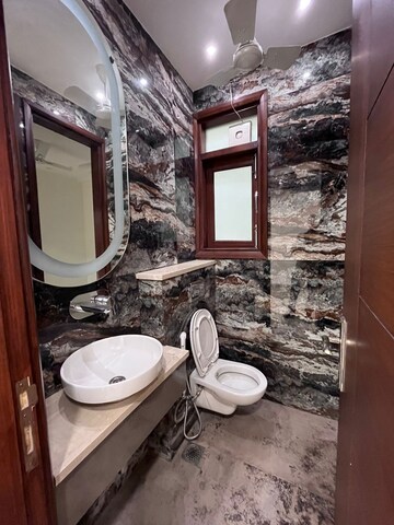 Attached Bathroom in 4 BHK Apartment at Sushant Lok I – for Rent