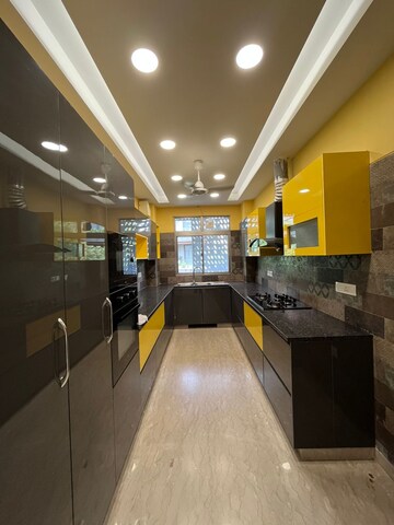 Kitchen in 4 BHK Apartment at Sushant Lok I – for Rent