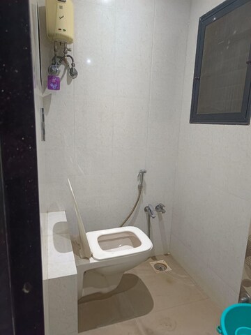 Bathroom in 2 BHK Apartment at Riddhi Gardens CHS, Malad East – for Rent