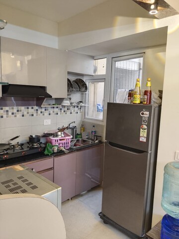 Kitchen in 2 BHK Apartment at Signature Global Orchard Avenue, Sector 93 – for Rent