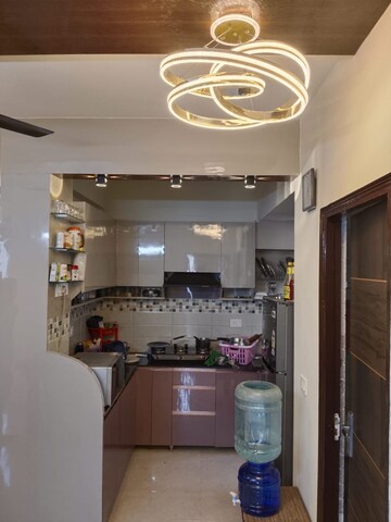 Kitchen in 2 BHK Apartment at Signature Global Orchard Avenue, Sector 93 – for Rent