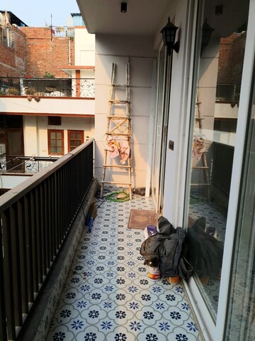 Balcony in 1.5 BHK Builder Floor at Khirki Extension – for Rent
