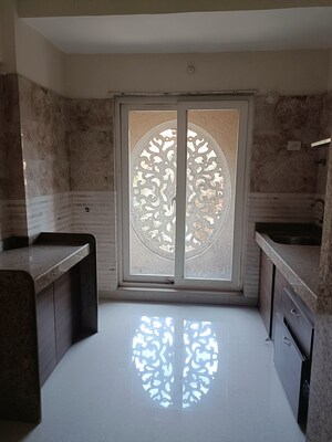 Kitchen in 1 BHK Apartment at Tharwani Akashat, Titwala – for Sale